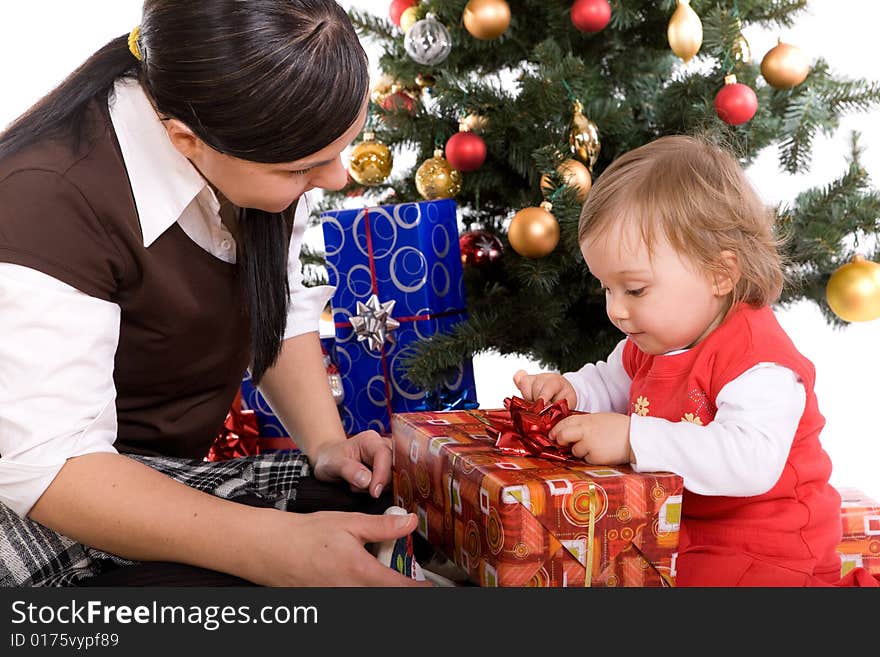 Happy mother and daughter over christmas tree. Happy mother and daughter over christmas tree