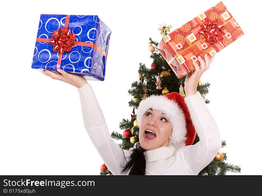 Happy brunette woman over christmas tree. Happy brunette woman over christmas tree