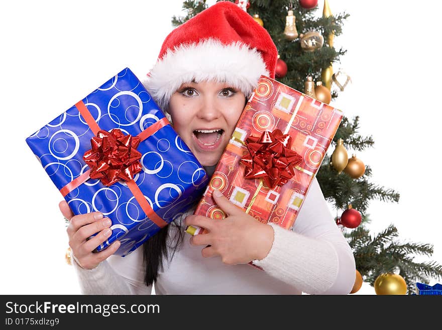 Happy brunette woman over christmas tree. Happy brunette woman over christmas tree