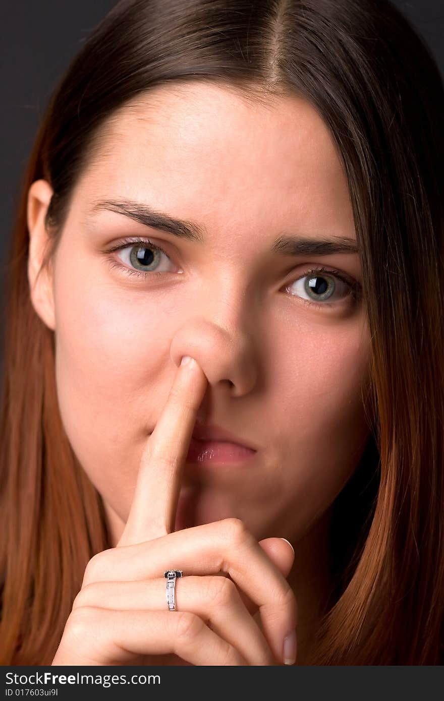 The Girl Picks A Finger In A Nose