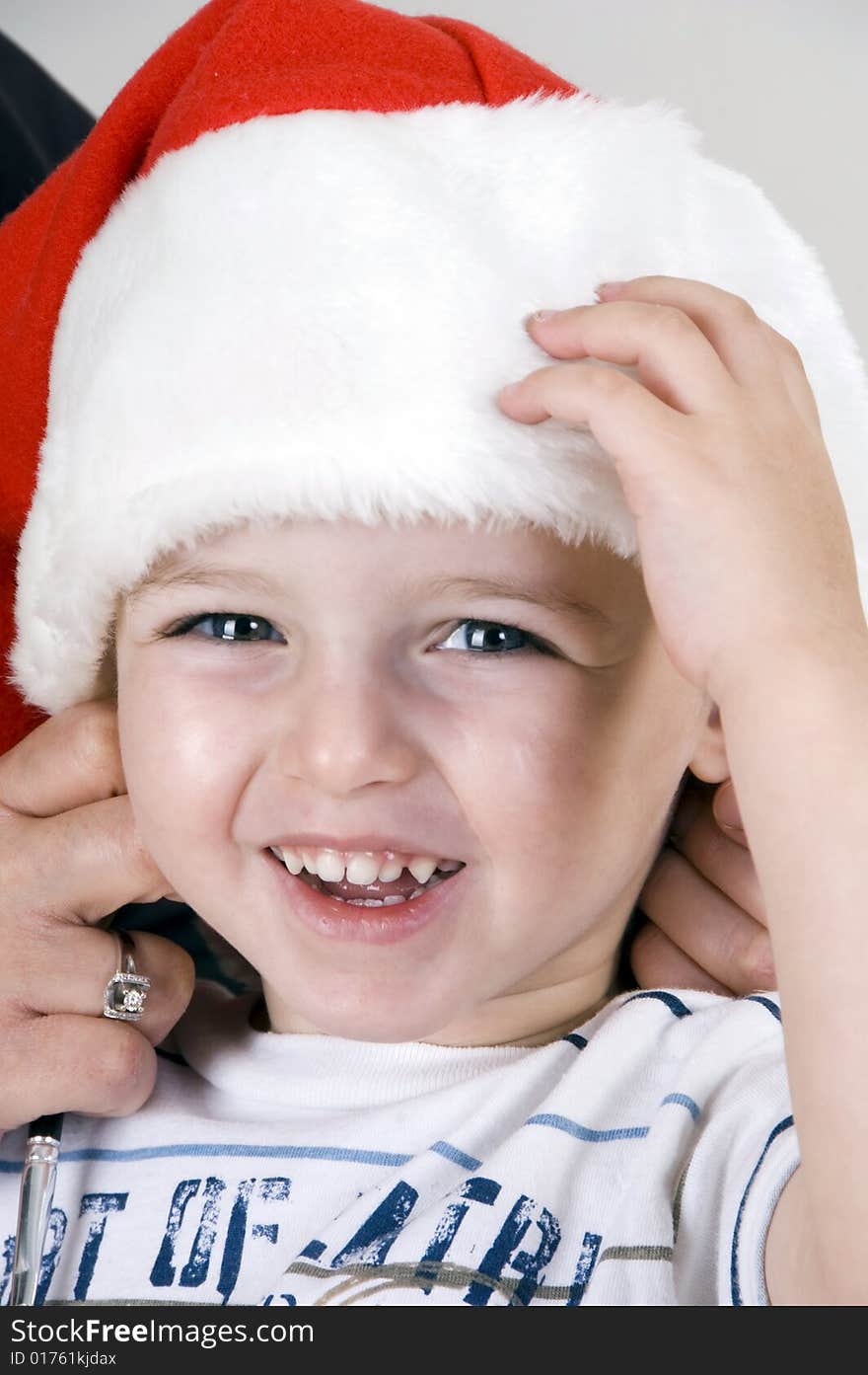 Portrait of cute little boy with christmas hat