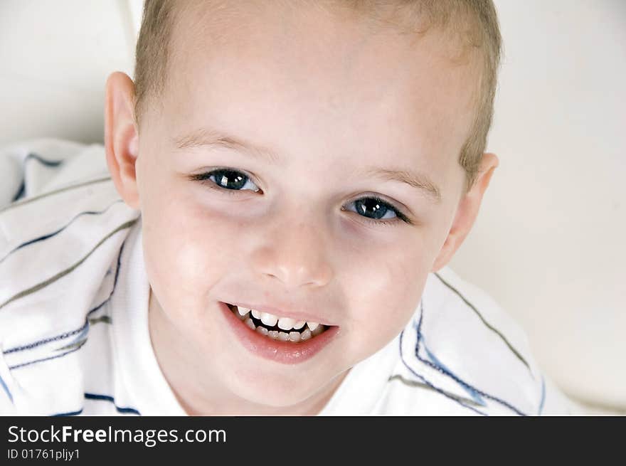 Cute smiling boy looking at camera