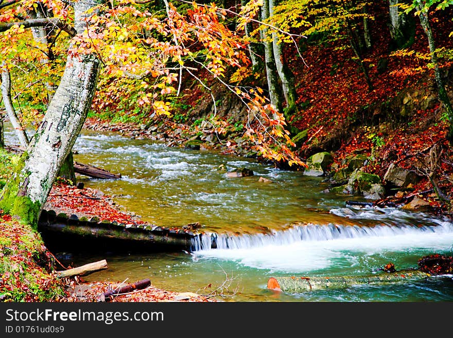 An image of river in autumn mountains. An image of river in autumn mountains