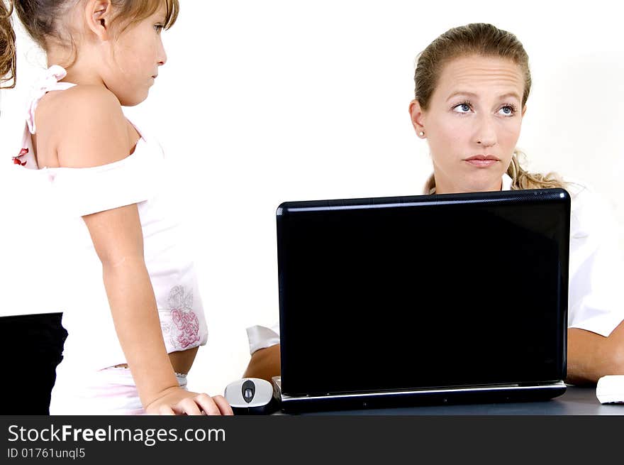 Portrait of mother and daughter with laptop