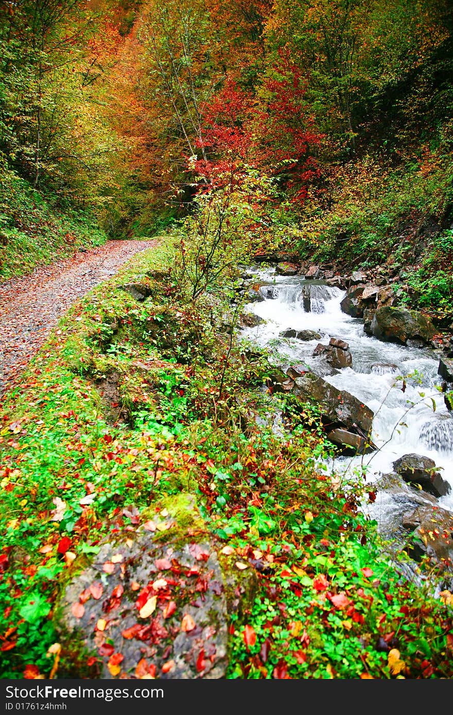 An image of river in autumn mountains. An image of river in autumn mountains