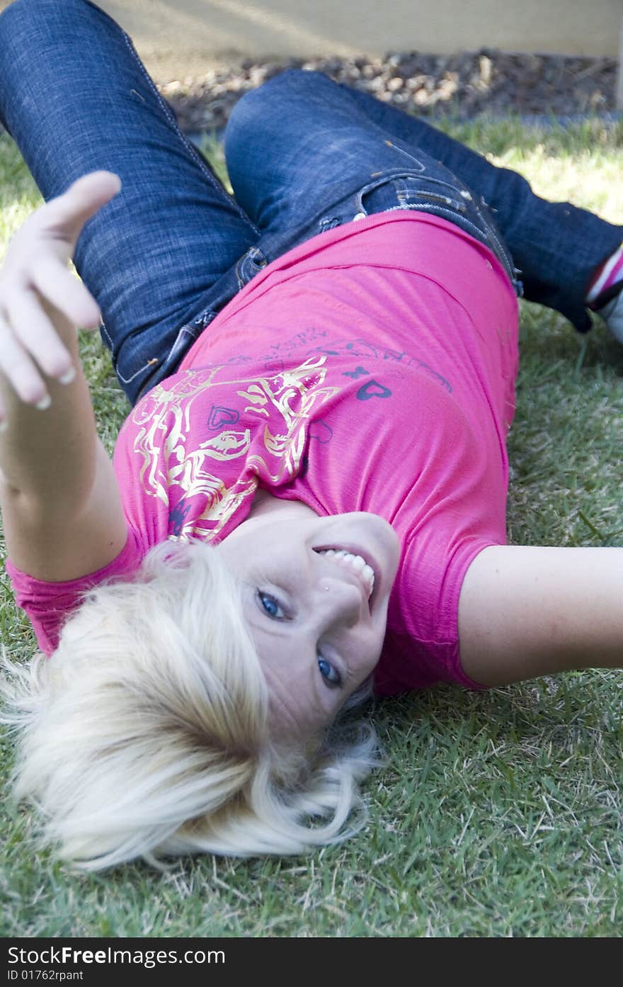 Young blonde woman posing