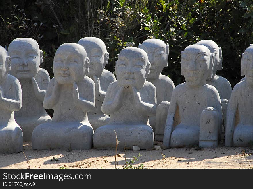 Stone Buda´s on a garden