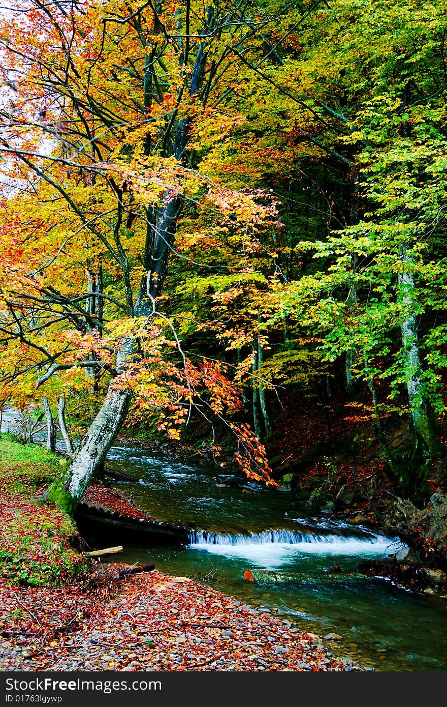 An image of river in autumn mountains. An image of river in autumn mountains