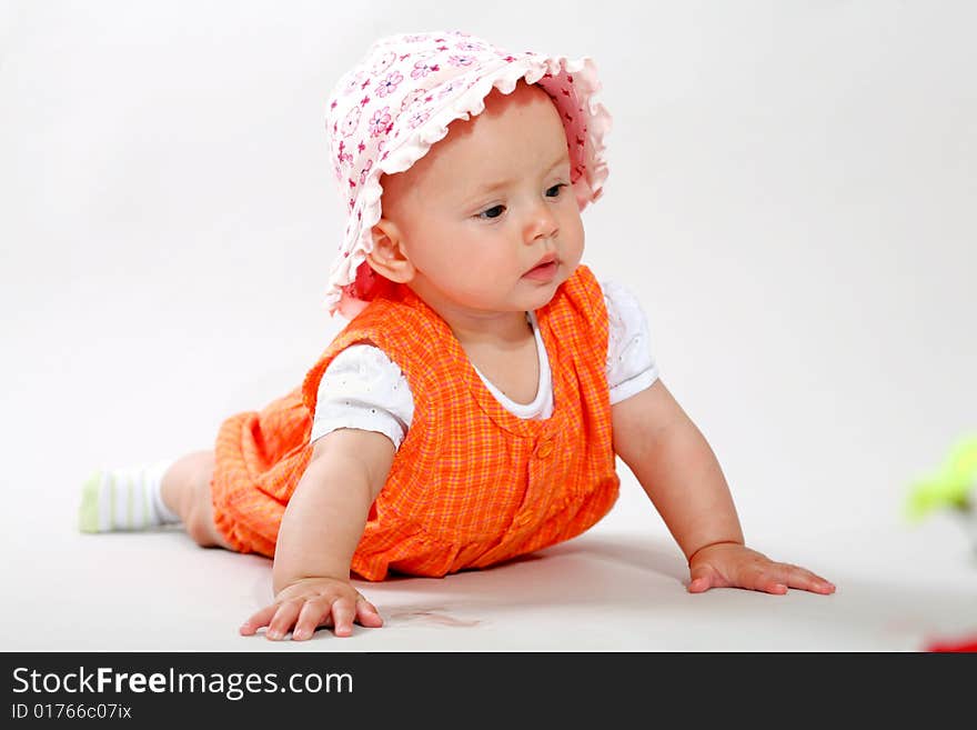 An image of cute baby in a studio. An image of cute baby in a studio