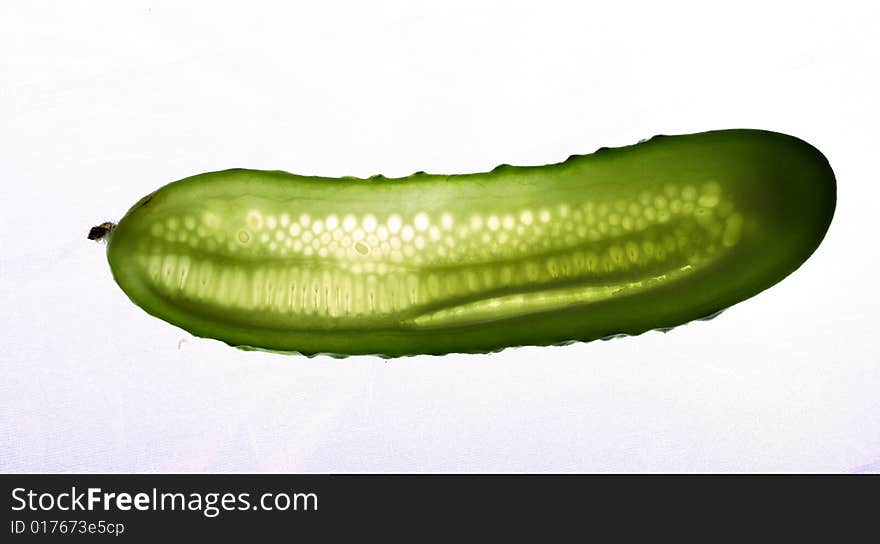 Green fresh cucumber isolated over white background