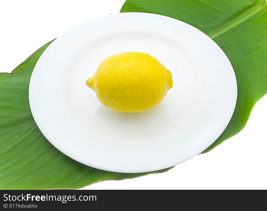 Lemon on a white plate