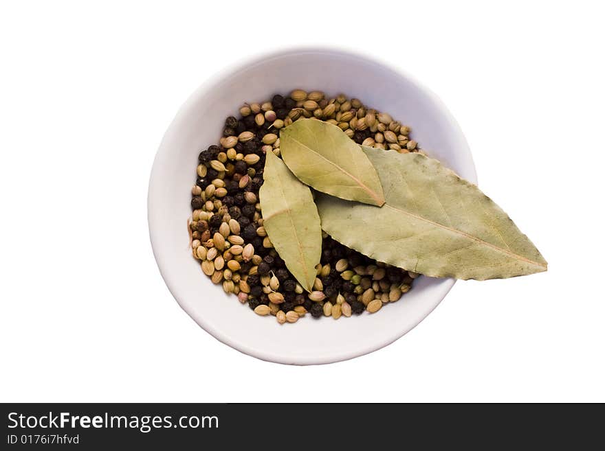 Bay leaves,coriander seeds,peppercorns in bowl