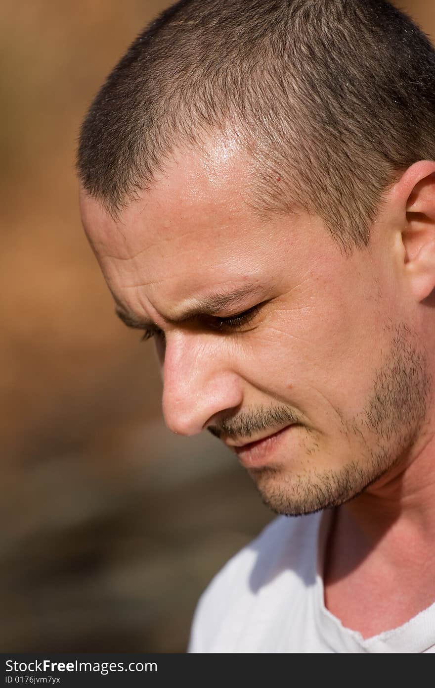 Close-up portrait of a man with powerful expression of concentration. Close-up portrait of a man with powerful expression of concentration