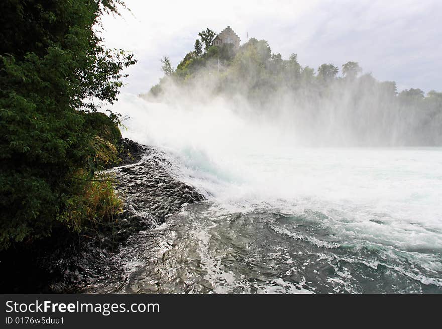 The Europe largest falls Rhine Falls in Switzerland. The Europe largest falls Rhine Falls in Switzerland