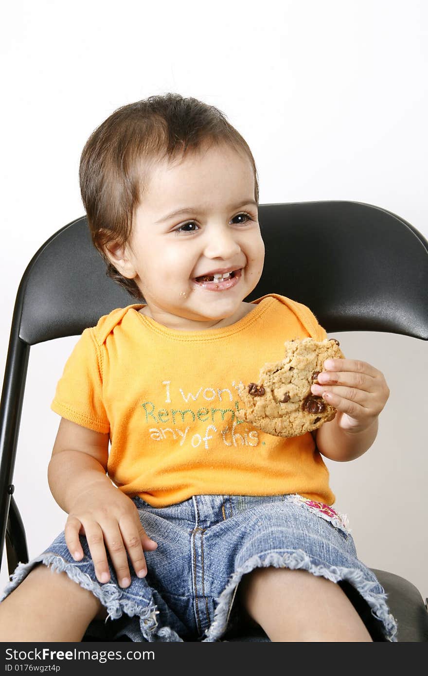 Small Girl Eating Cookies