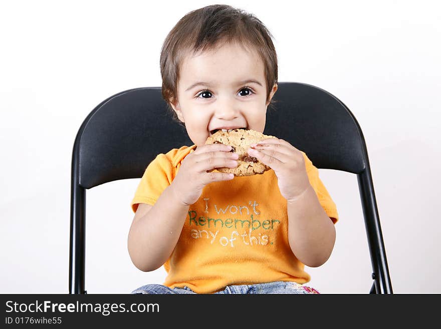 Small Girl Eating Cookies