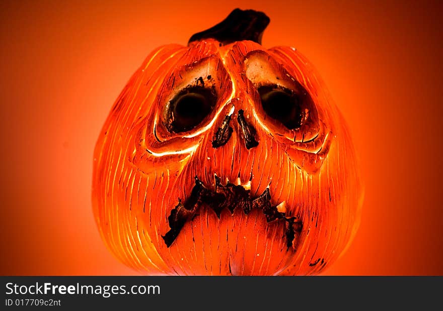 A glowing but frowning Jack O Lantern. A glowing but frowning Jack O Lantern