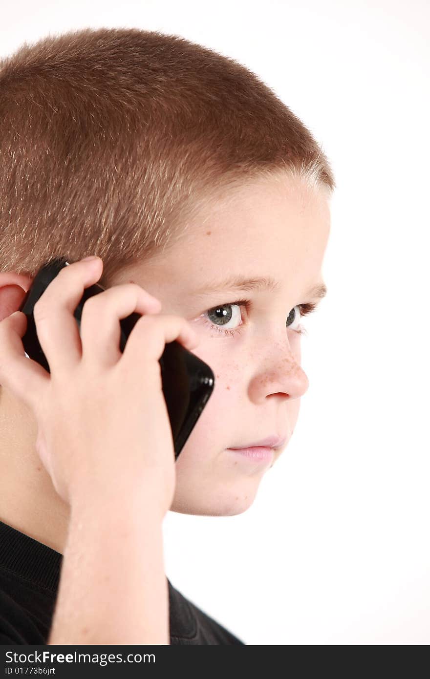 Young boy is holding the phone and wait for call. Young boy is holding the phone and wait for call