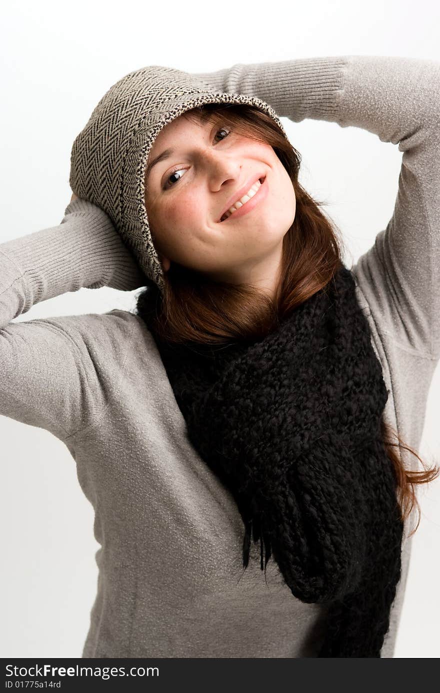 Playful woman, or teen in fall or winter clothing.