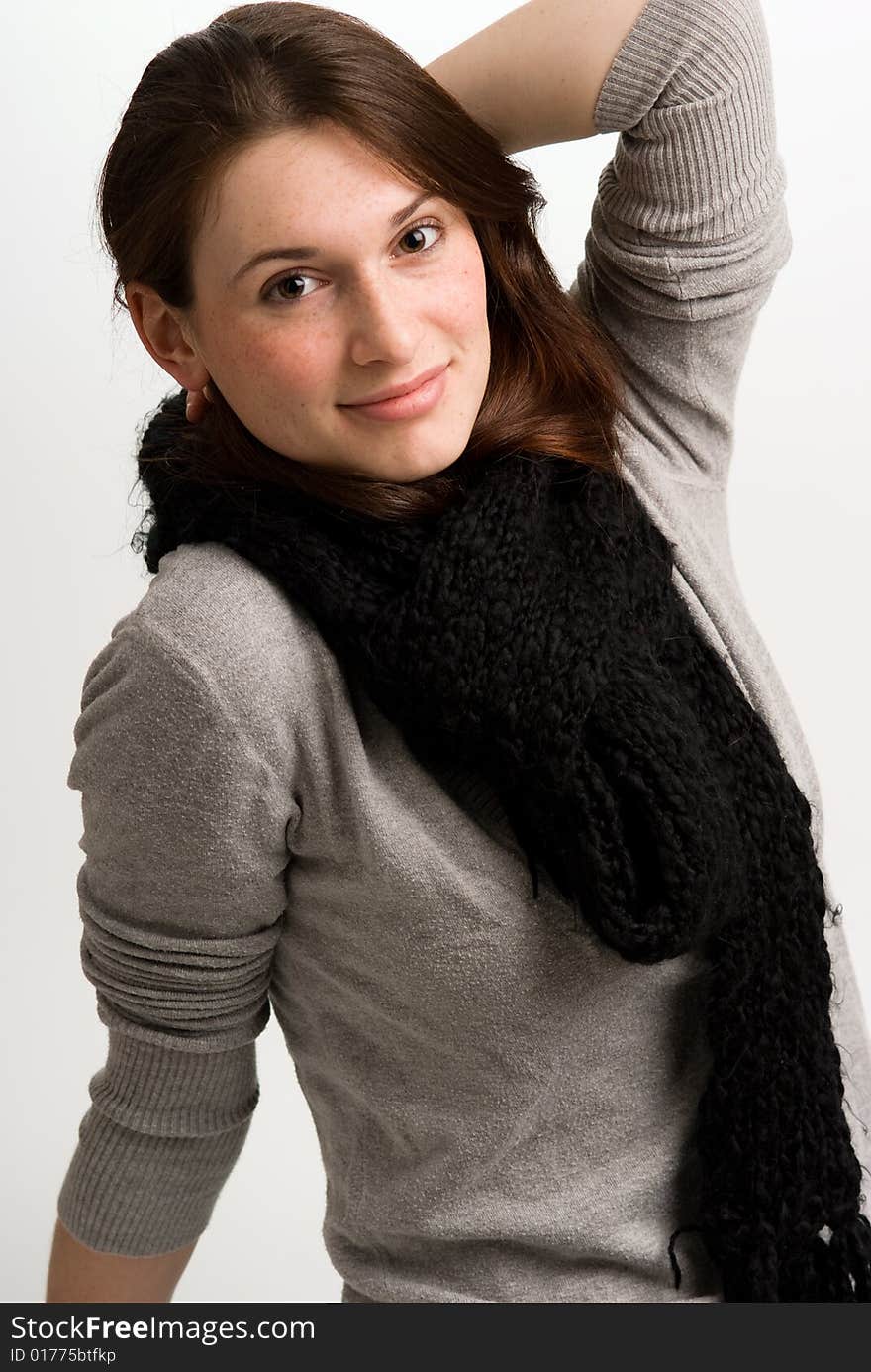 Playful woman, or teen in fall or winter clothing.