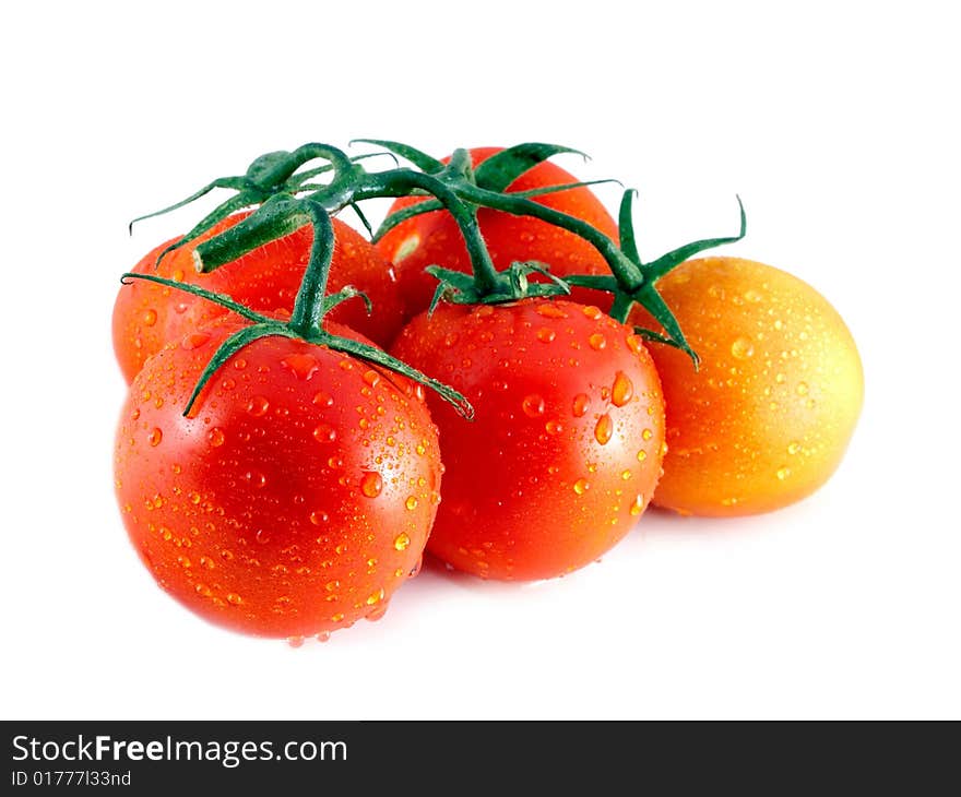 Red tomatoes isolated on white