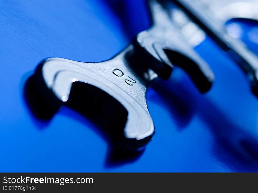 Spanners On A Blue Background