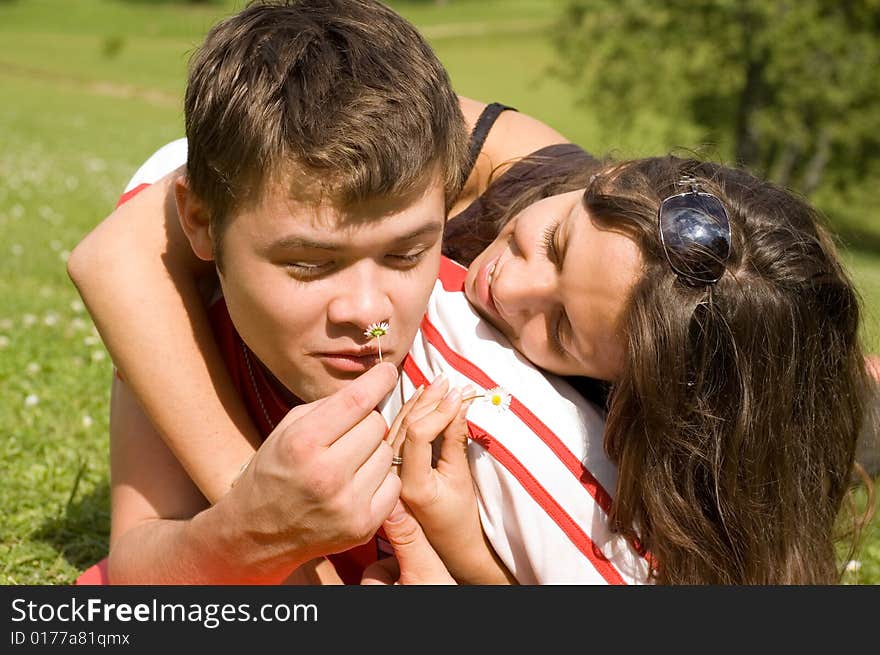 Happy couple playing in the park