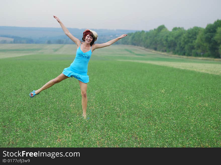 Young Woman And Green Field