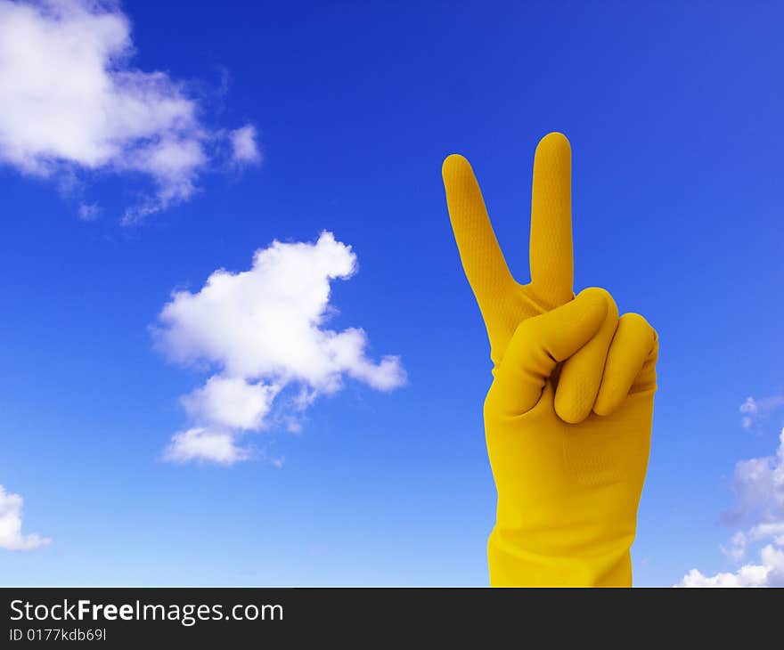 Victory sign on sky background