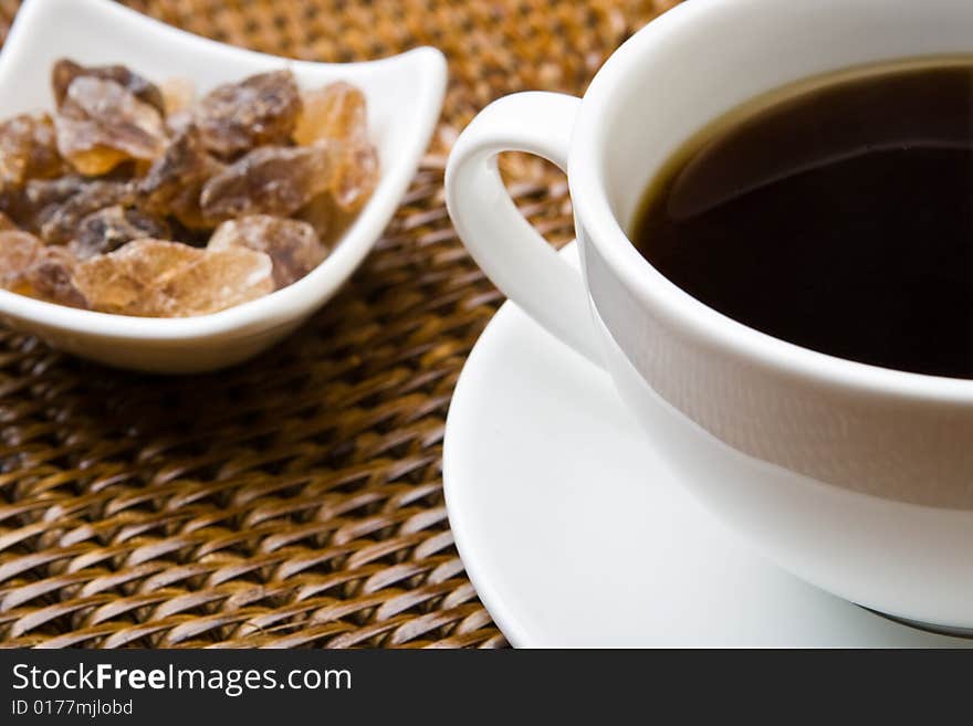 Cup of black coffee with rock sugar. Cup of black coffee with rock sugar