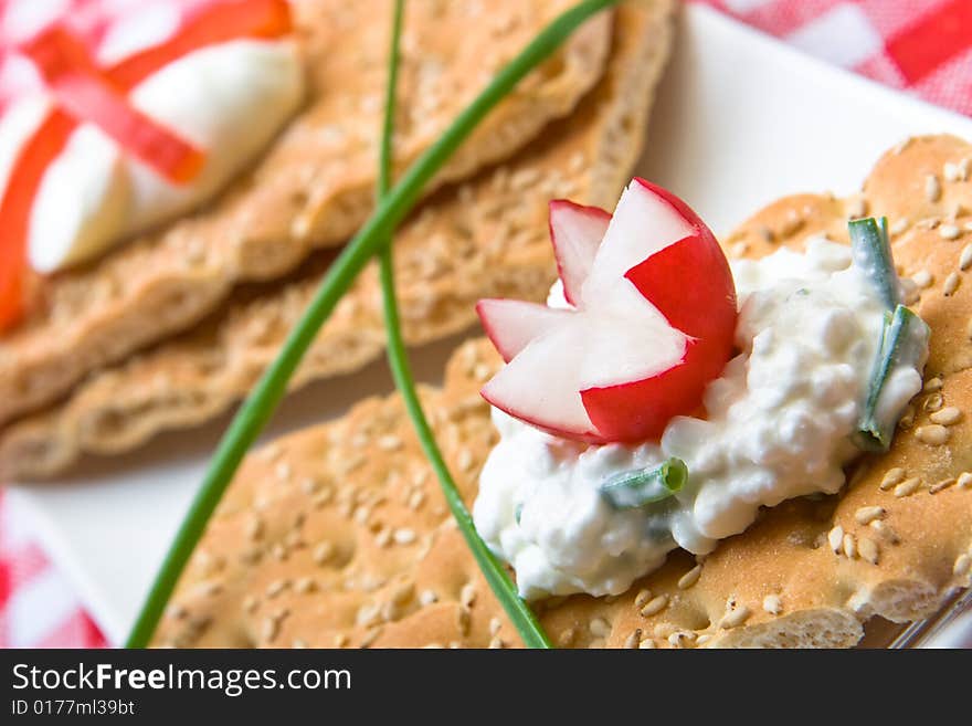 Delicious crispbreads with cottage cheese and chives. Delicious crispbreads with cottage cheese and chives