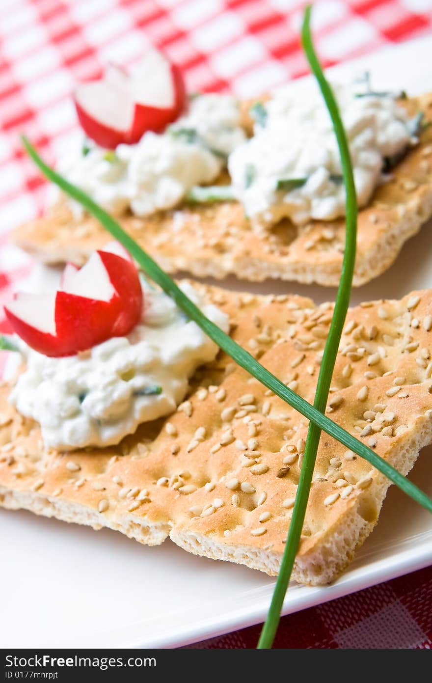 Delicious crispbreads with cottage cheese and chives. Delicious crispbreads with cottage cheese and chives