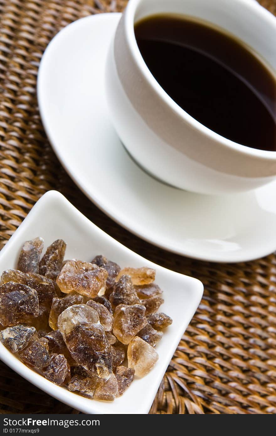 Cup of black coffee with rock sugar. Cup of black coffee with rock sugar