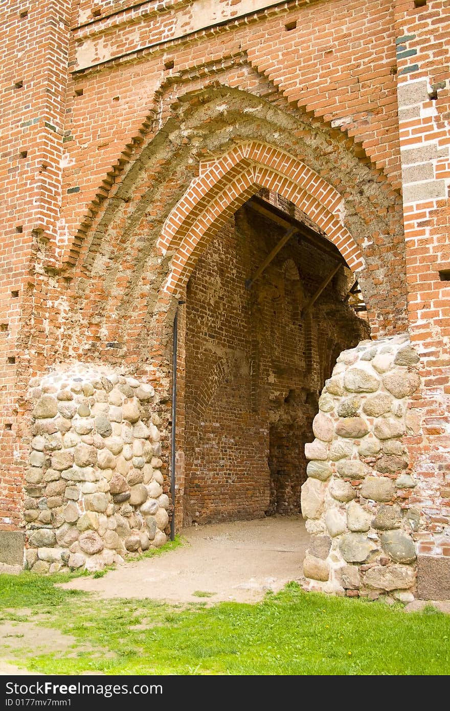 Ruined medieval castle in Latvia on a background of the blue sky