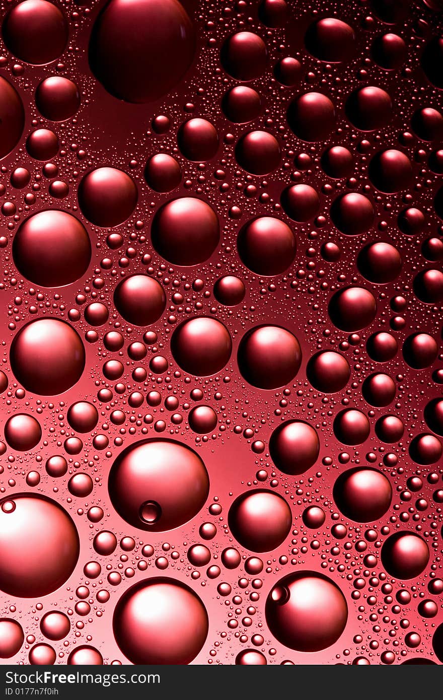 Red round water drops background. Red round water drops background