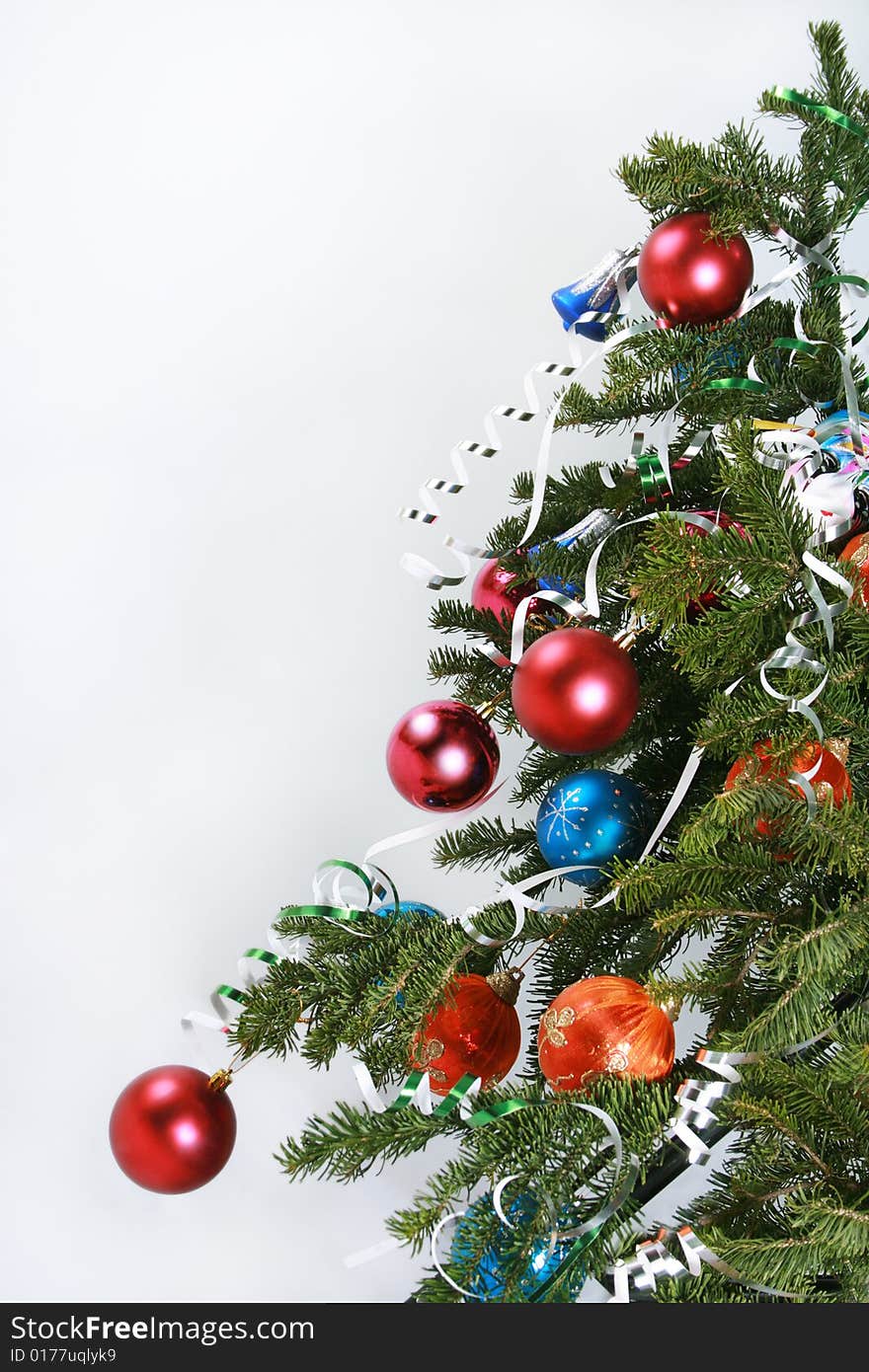 Colorful ornament hanging on Christmas tree