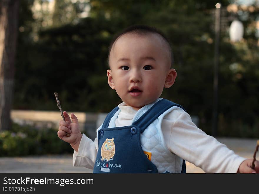 The lovable boy in the afternoon in the park. The lovable boy in the afternoon in the park