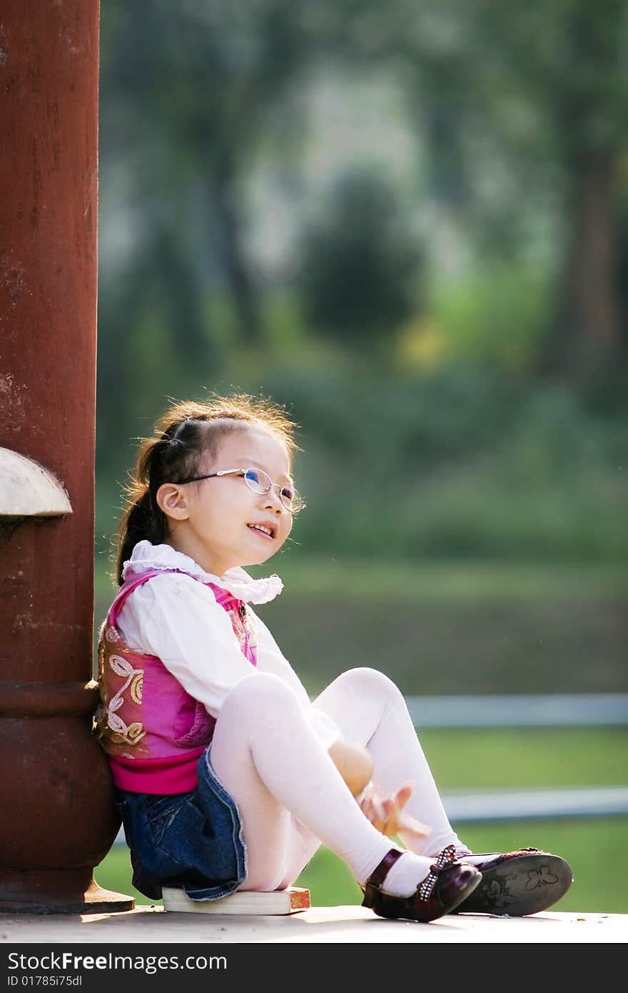 The girl read a book outside. The girl read a book outside.