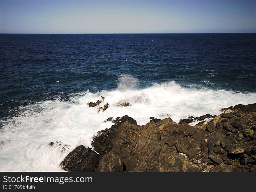 Big Waves.
Where the waves crash against the rock cliff