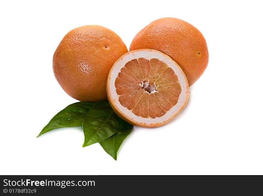 Ruby grapefruits isolated on white