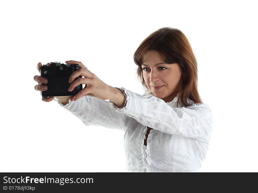 Young woman with old camera