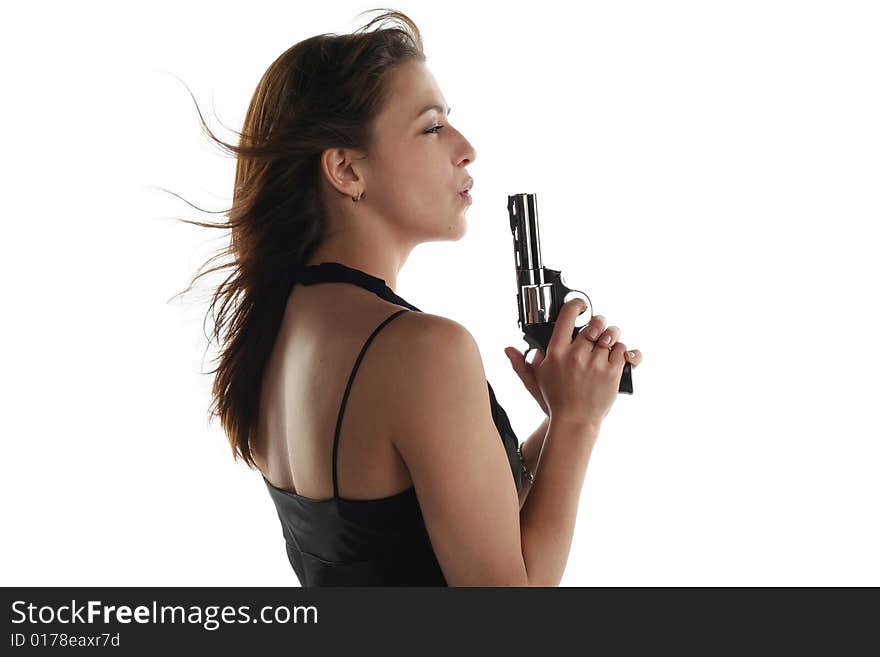 Young woman with revolver