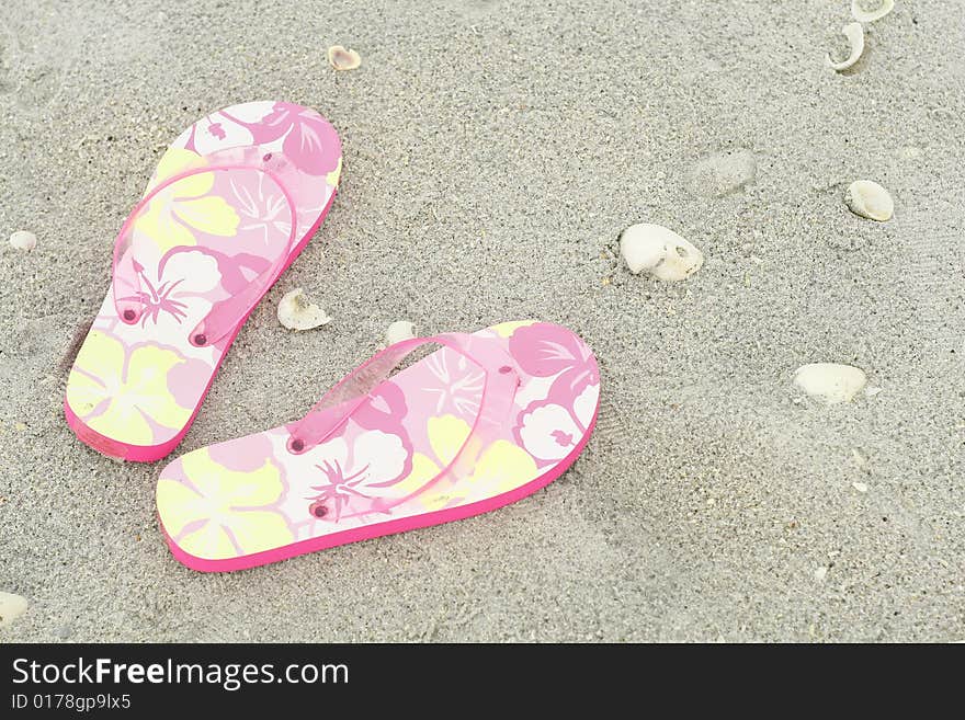 Flip flops in the sand