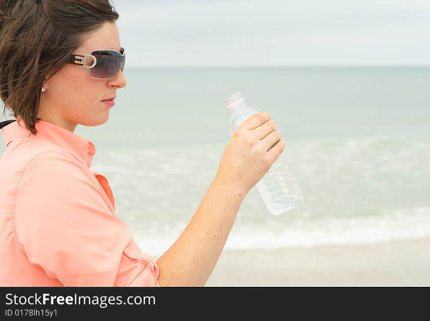 Brunette with bottled water