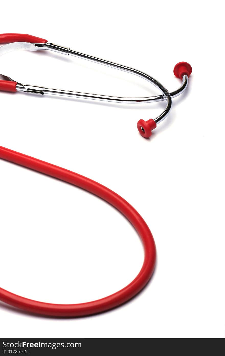 Red stethoscope isolated in white background