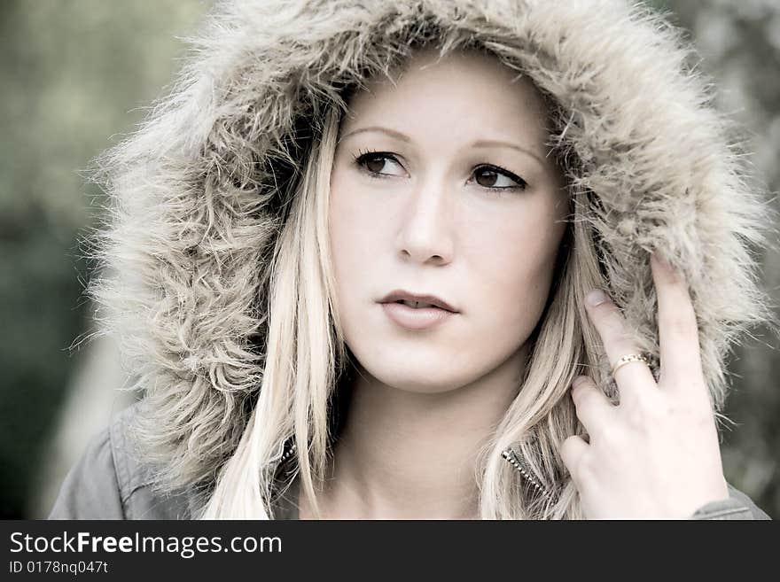 Blond girl with a cap