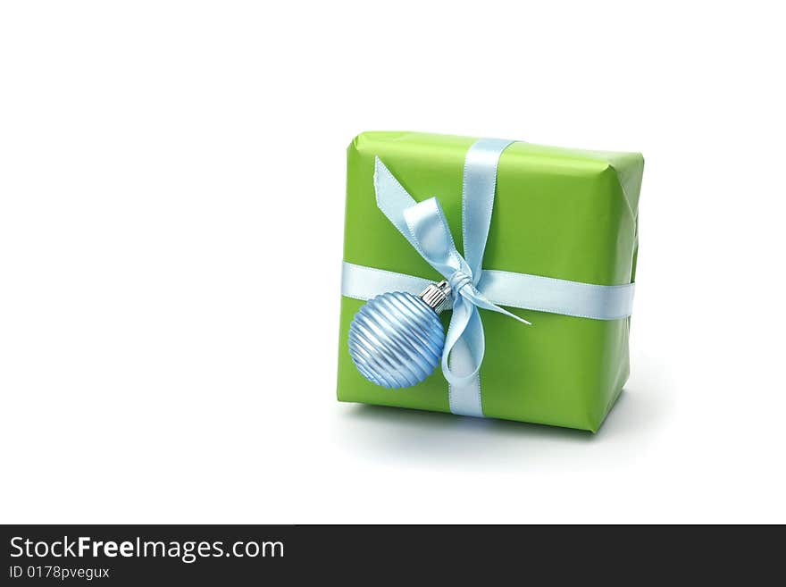 Green present box with blue ribbon isolated on white background. Green present box with blue ribbon isolated on white background