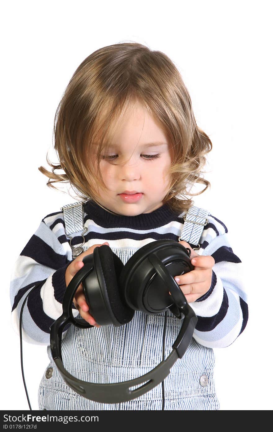 Beauty a little girl listening music on white background