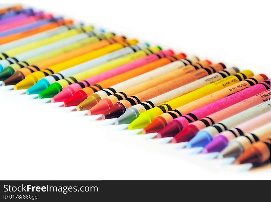 Color crayons in a straight line