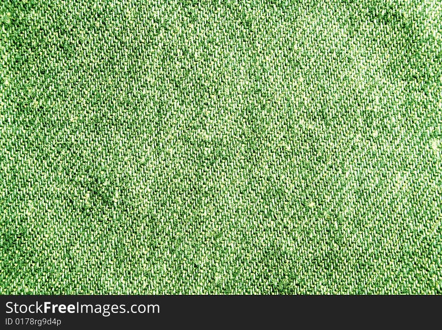 A piece of a green jeans